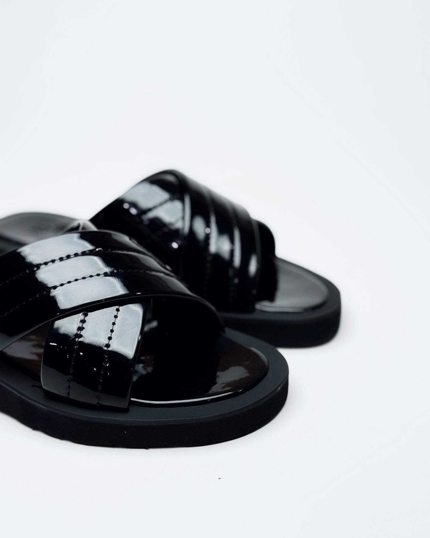 Puffer black cross strap